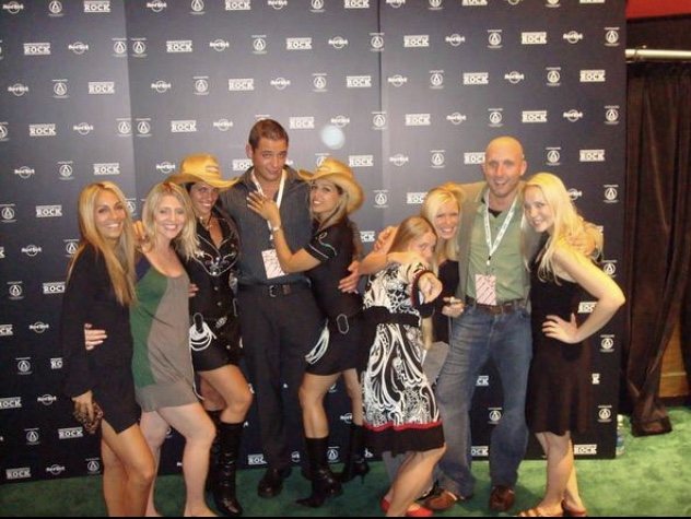 Scott with the team on the red carpet at a Bacardi event